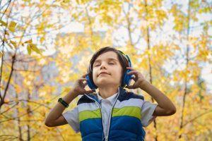 Baby-boy-listening-to-headphones